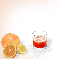 Aperol Sour in a tumbler glass.