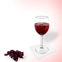 Berry punch in a red wine glass.