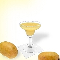 Frozen Mango Margarita served in a margarita glass with a sugar or salt rim.