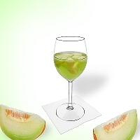 Melon punch in a red wine glass.